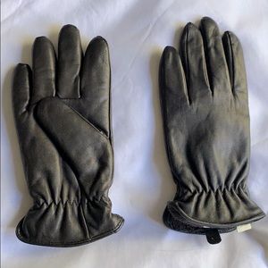 Black leather gloves with fur lining
